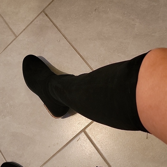 Knee-length boots with gold heel accent, side zipper, and adjustable back laces. - Picture 10 of 14